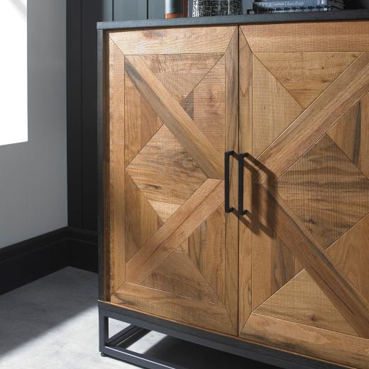 A close-up look at the Lowry Rustic Oak Wide Sideboard reveals what sets it apart: intricate oak grai...